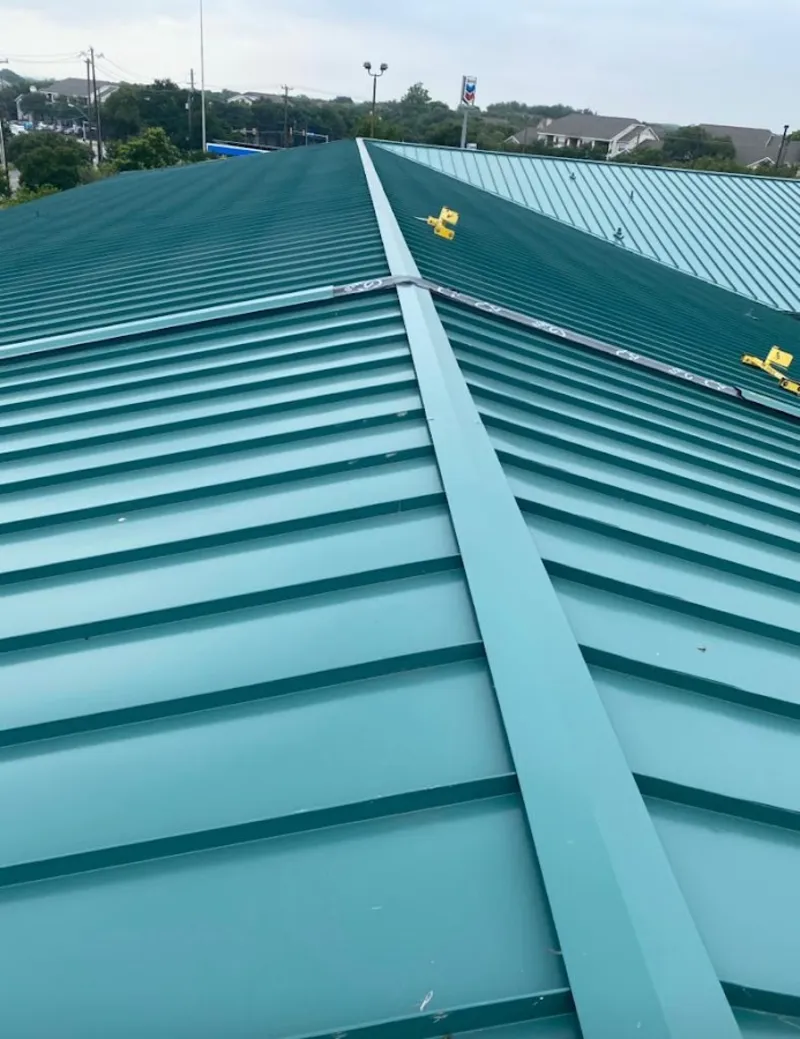 Green commercial metal roof ridge and valley for Metal Roof Repair in McNair