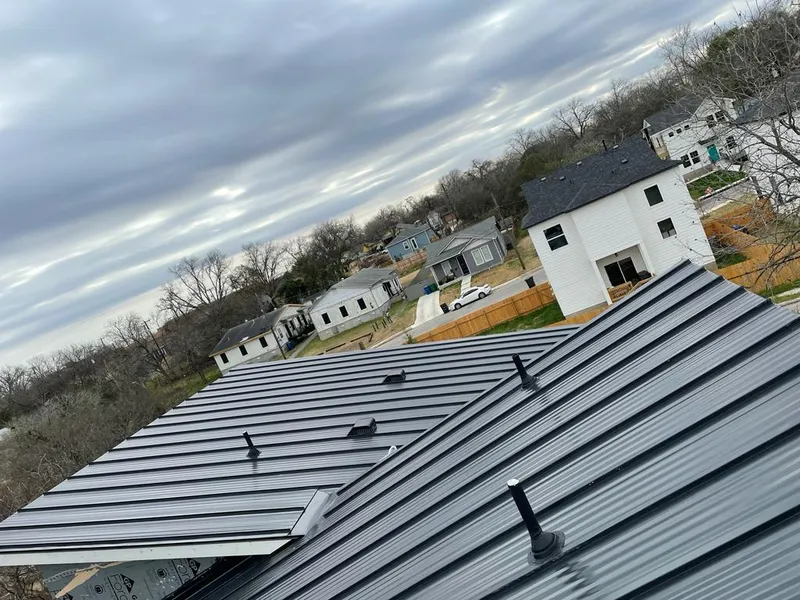 Standing seam metal roof panels with vents for Skylight Repair in McNair